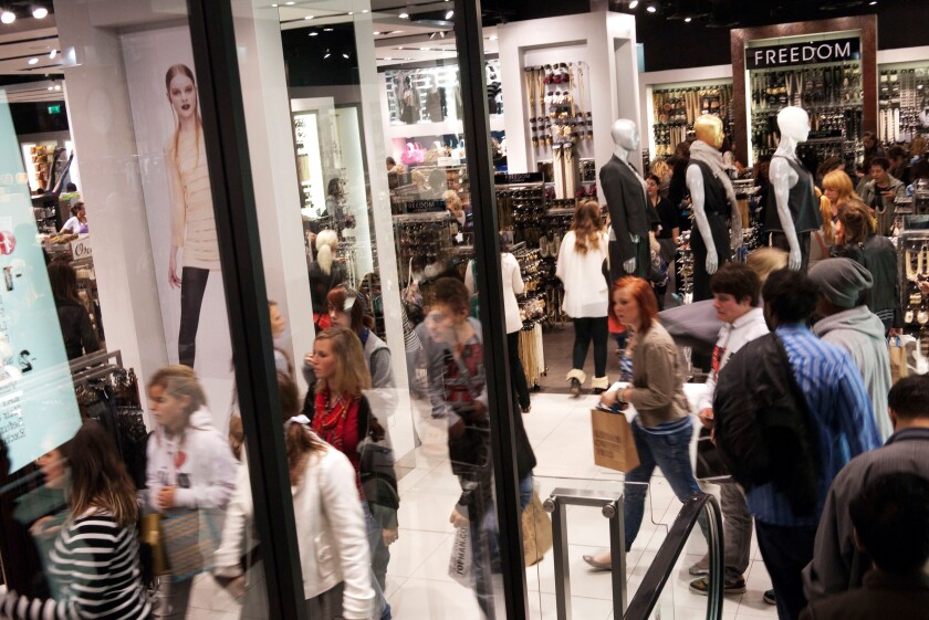 Busy shop floor at Topshop, London. This is one of the most successful mainstream retail shopping outlets in the UK.