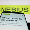 Stuttgart, Germany - 11-06-2025: Mobile phone with website of AI infrastructure company Nebius Group N.V. on screen in front of logo.