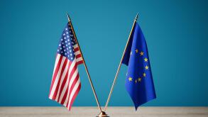 Transatlantic Partnership Concept. USA And European Union Flags Crossed On Golden Stand Against Blue Background. 3d Rendering