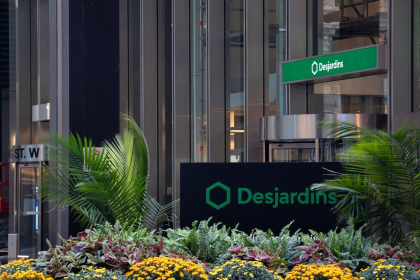 The Desjardins Group logo is seen out front of an office building in downtown Toronto.