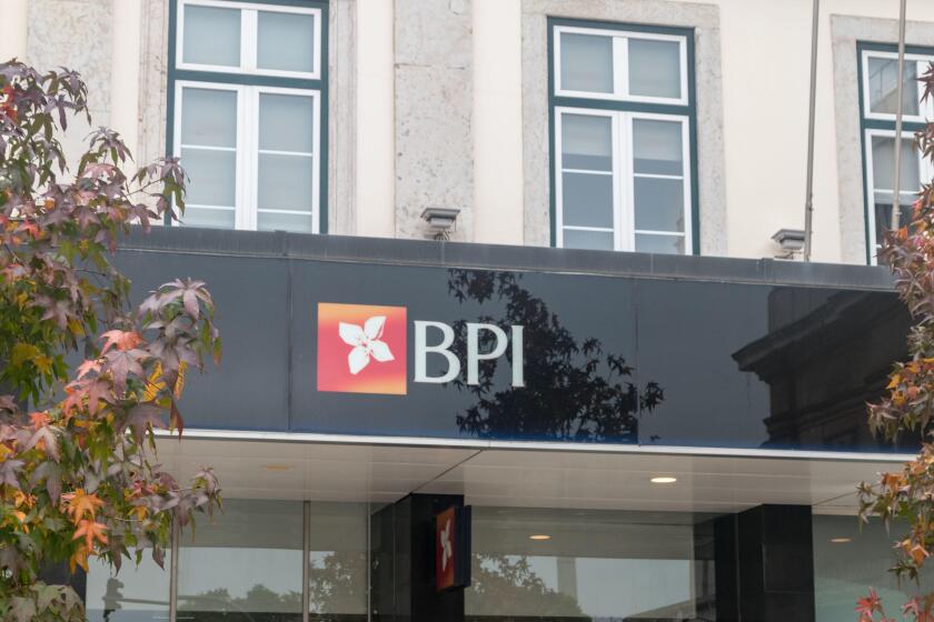 Lisbon, Portugal - December 5, 2022: Logo and sign of Banco Portugues de Investimento.
