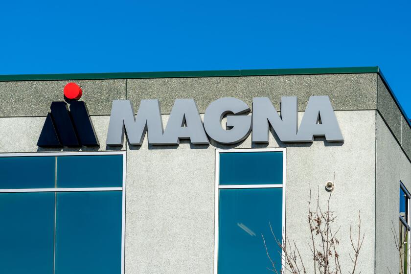 Close up of Magna sign on the building.