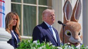 President Donald Trump and first lady Melania Trump participate in the White House Easter Egg Roll on the South Lawn of the White House, Monday, April 6, 2026, in Washington. (AP Photo/Mark Schiefelbein)