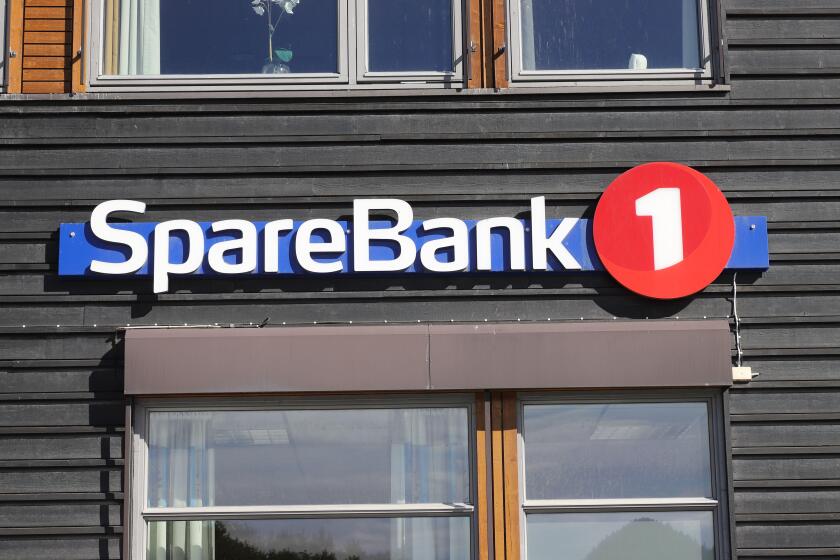 Storen, Norway - September 2, 2022: Close-up view of the Sparebank 1 bank office exterior sign.