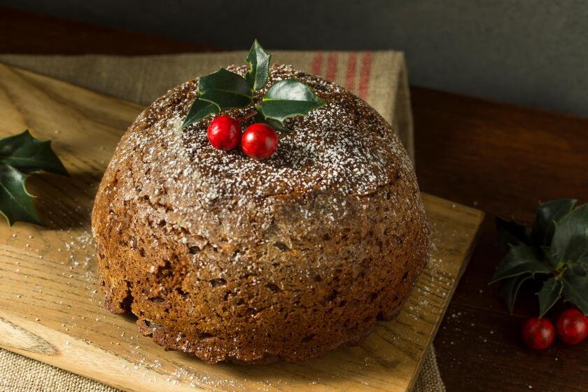 Sweet Homemade Christmas Figgy Pudding with Powdered Sugar