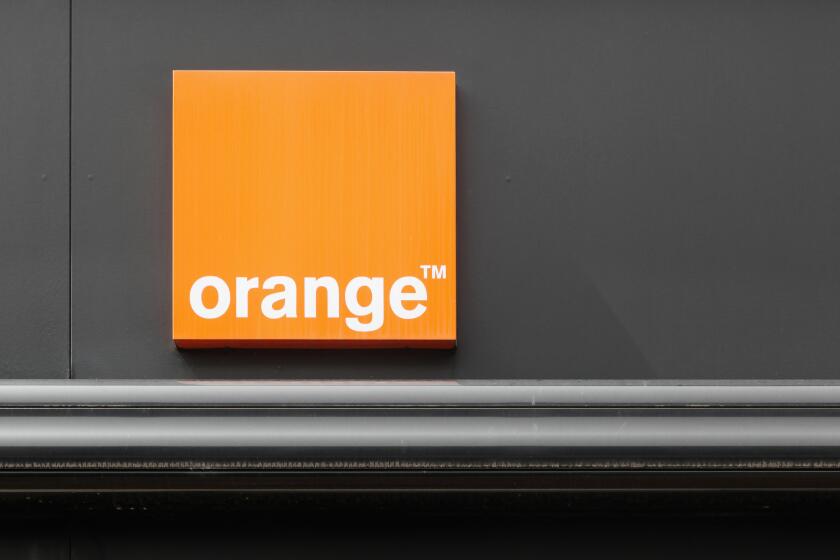 Orange logo on a wall