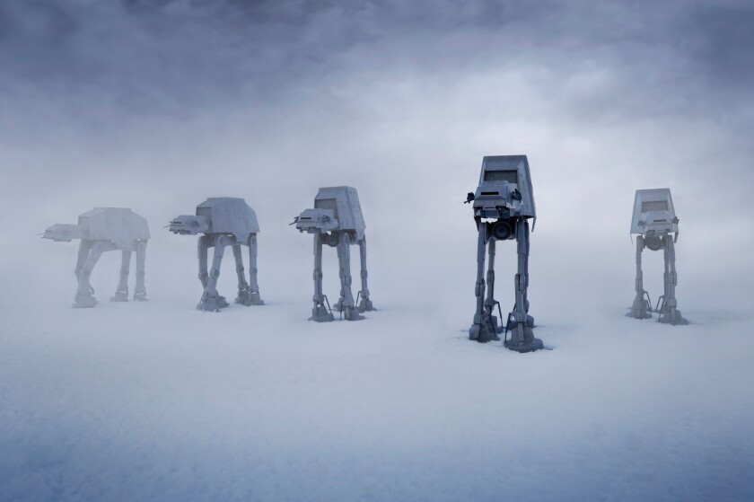 Imperial Walkers (AT-ATs) similar to those seen in film The Empire Strikes Back. (Editorial use only).