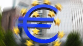 EURO crisis - European Central Bank (ECB) with the Euro sign outside in Frankfurt (Main)