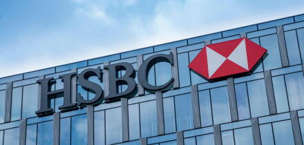 Milan, Italy: HSBC bank logo on the building of company headquarters in Milan