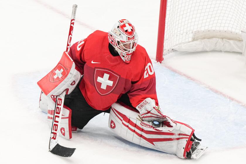 Beijing, China. 7th Feb, 2022. Andrea Braendli of Switzerland competes during the ice hockey women's Group A match between Switzerland and Finland at National Indoor Stadium in Beijing, capital of China, Feb. 7, 2022. Credit: Du Yu/Xinhua/Alamy Live News