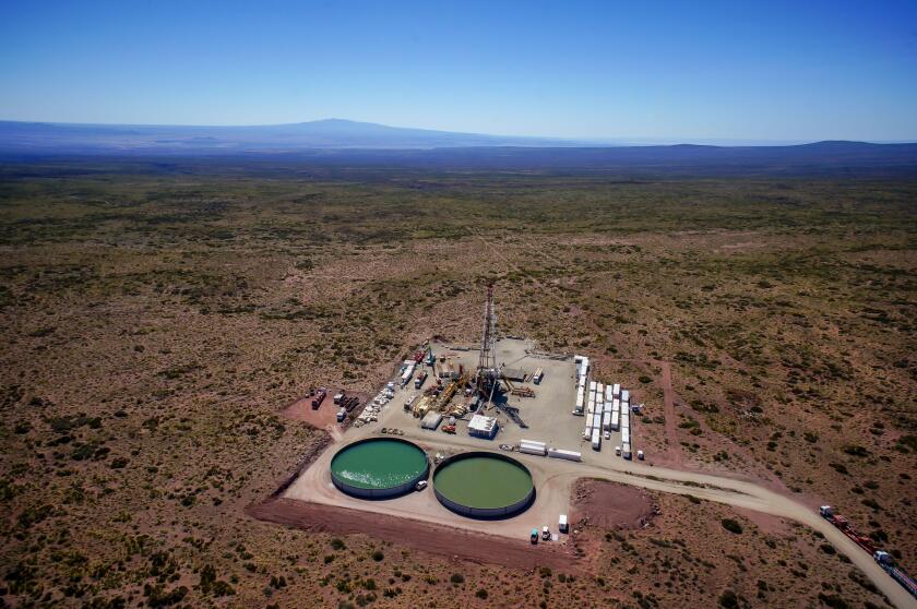 Vaca Muerta, Argentina, November 22, 2015: Extraction of unconventional oil. Battery of pumping trucks for hydraulic fracturing.