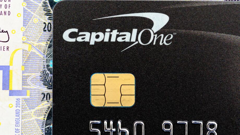 A Capital one credit card close up showing chip and pin contact England UK