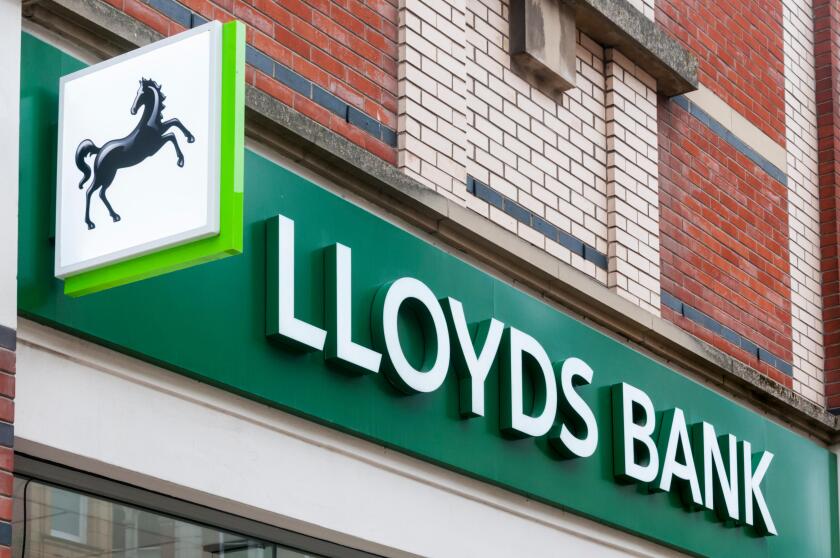 Lloyds Bank Black Horse sign and name over a branch of the bank in UK.