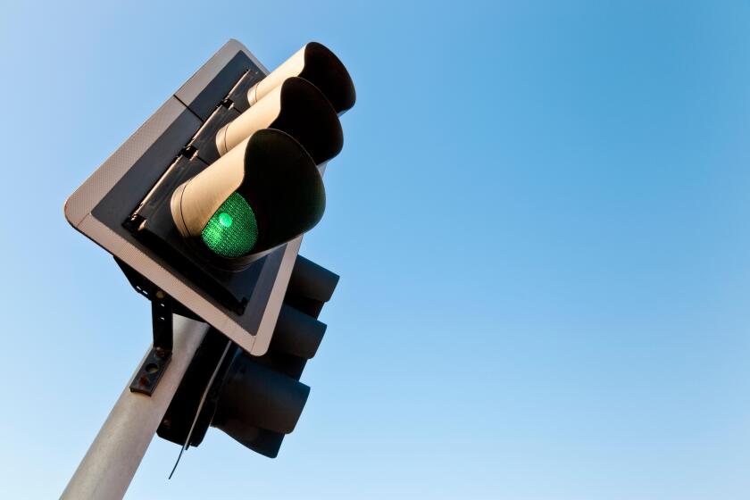 Traffic lights with the green light on go, England, UK