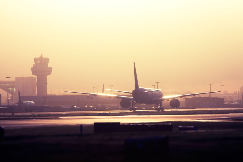 Commercial airliner taxiing at London Gatwick Airport, UK