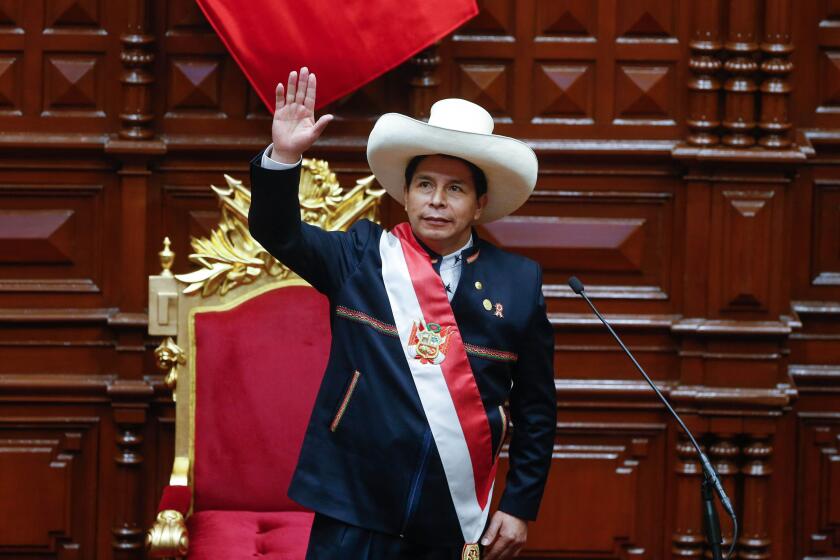 (210729) -- LIMA, July 29, 2021 (Xinhua) -- Pedro Castillo is sworn in as president of Peru during a ceremony in the nation's Congress in Lima, Peru, July 28, 2021. Pedro Castillo was sworn in on Wednesday as president of Peru during a ceremony in the nat