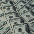 A multitude of laid-out and overlapping US hundred-dollar bills