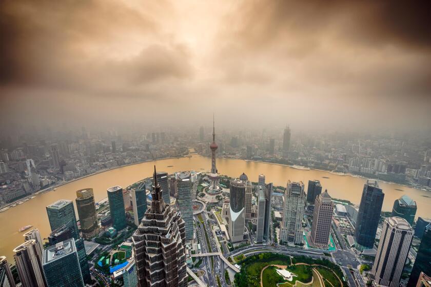 Shanghai, China City Skyline view over the Pudong Financial District.