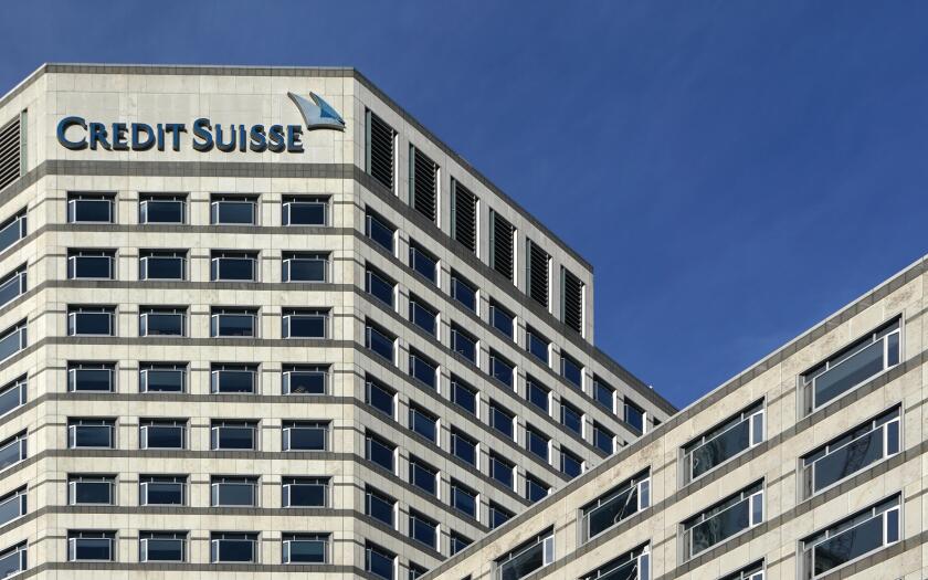 London, United Kingdom - February 03, 2019: UK branch of Credit Suisse at Canary Wharf. CS Group AG is multinational investment bank founded in 1856