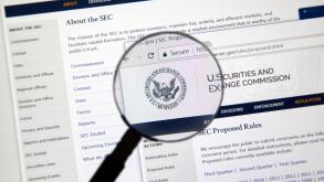 MONTREAL, CANADA - NOVEMBER 7, 2017: SEC webpage under magnifying glass. The U.S. Securities and Exchange Commission is an independent agency of the U