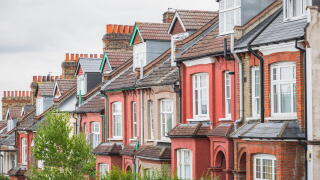 Row of English traditional terraced houses in Crouch End, North London, UK