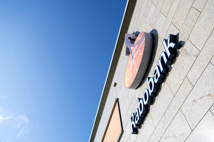Rabobank sign at branch. Rabobank is the second-largest bank in the Netherlands in terms of total assets.