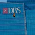 Singapore. 13th Aug, 2015. A raptor flies past a building of DBS Bank in Singapore's Marina Bay Financial Centre, Aug. 13, 2015. Singapore's Ministry of Industry and Trade (MTI) downgraded its full-year economic growth forecast from 2.0-4.0% to 2.0-2.5 pe