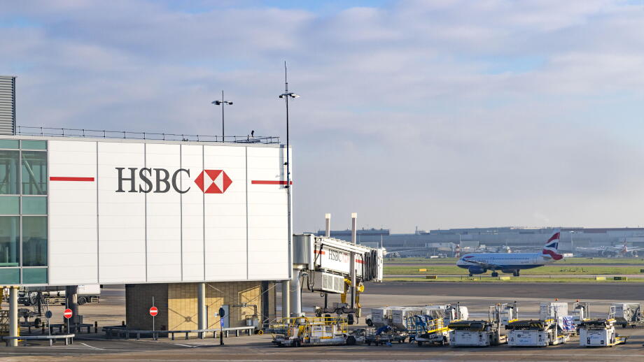 HSBC advertisement, - the HSBC logo at Heathrow airport UK