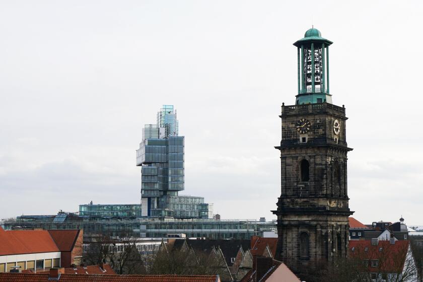 modern NordLB building and historic Aegidienkirche church tower