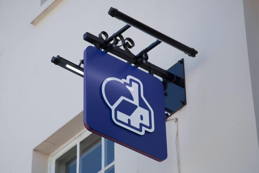 The Nationwide Building Society sign hanging above a branch in the UK