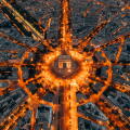 Aerial of the Arc de Triomphe in Paris, France at night