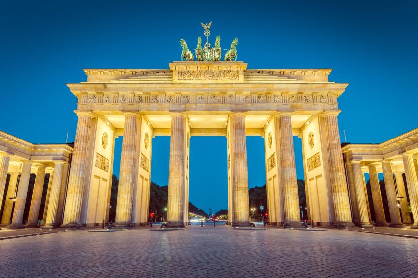 Classic view of famous Brandenburger Tor (Brandenburg Gate), one of the best-known landmarks and national symbols of Germany, in twilight, Berlin