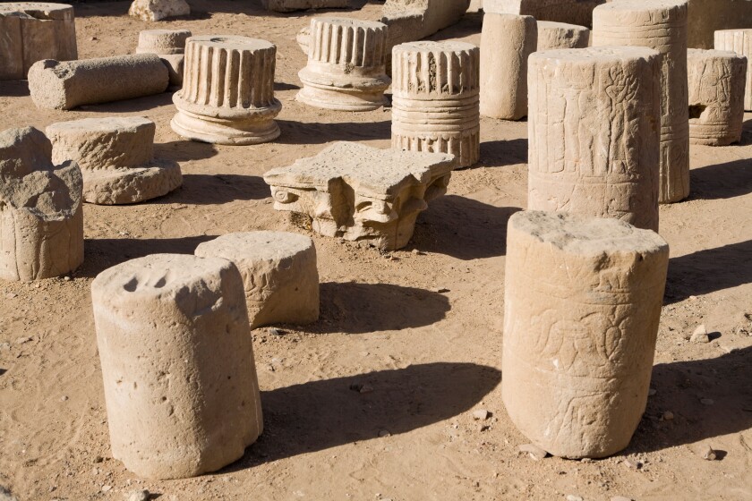 Broken pillar sections in the open air museum at the Temple of Edfu Egypt