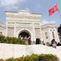 Istanbul Turkey - the main entrance gate to the Istanbul University with visitors in March 2024