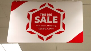 a sale sign in tesco supermarket, uk