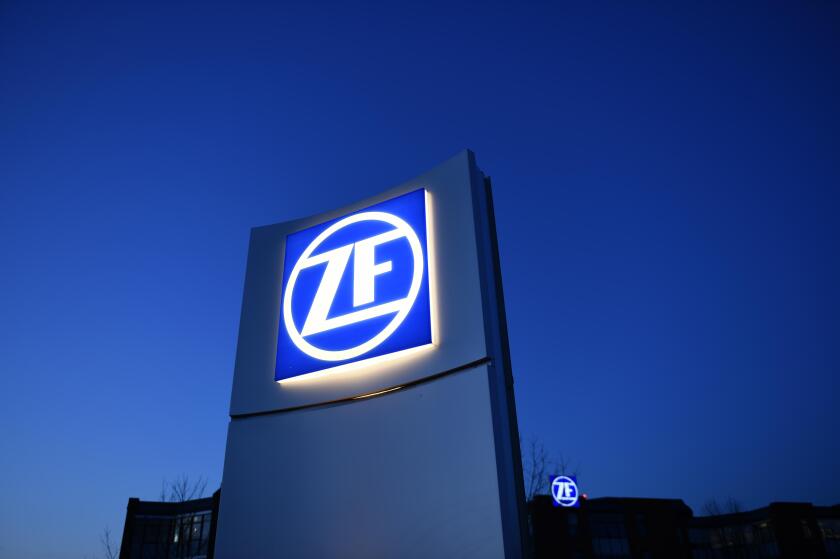 Freidrichshafen, Germany. 09th Mar, 2015. The logo of the German car parts maker ZF Friedrichshafen AG stands in front of the company's R&D center shortly after sunset in Freidrichshafen, Germany, 09 March 2015. Photo: Felix Kaestle/dpa/Alamy Live News