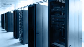 Room with rows of server hardware in an internet data center