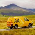 AA van on rural road. Aughertree Fell, Uldale, The Lake District National Park, Cumbria, England, United Kingdom, Europe.