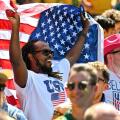 Seattle, WA, USA. 19th June, 2026. A Team USA fan waves the US flag as the team leaves the field after the FIFA World Cup soccer match between Australia and USA in Seattle, WA. Team USA defeated Australia 2-0. Steve Faber/CSM/Alamy Live News