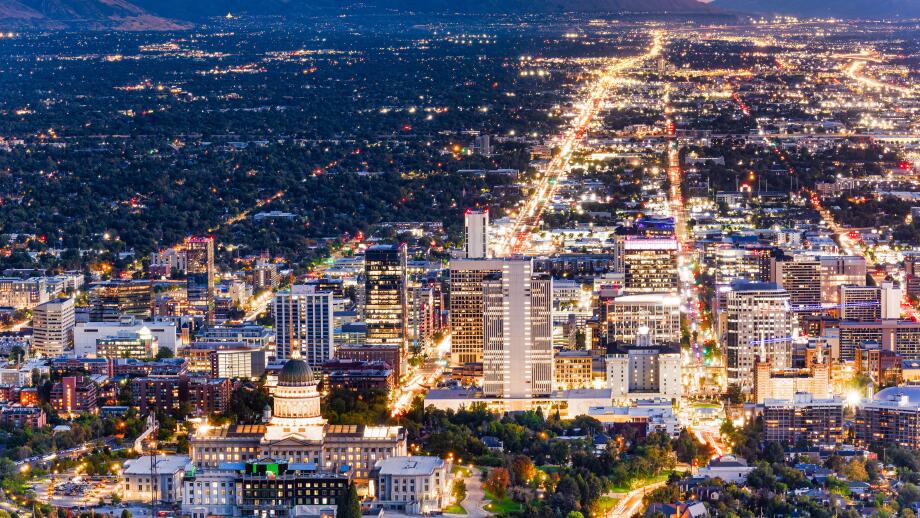 Aerial view of Utah State Capitol and Salt Lake City skyline at dusk. Salt Lake City, is the capital and most populous city of the U.S. state of Utah