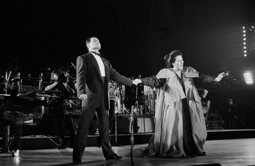 Freddie Mercury and Monserrat Caballe perform their hit song Barcelona during an outdoor concert held on the slopes of Barcelona's Montjuich park, to celebrate the arrival of the olympic flag from Seoul and the launch of Spain's four-year cultural olmpiad.