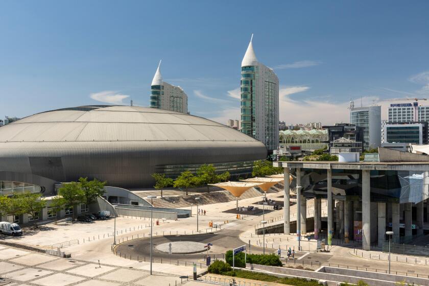 Beautiful view to modern buildings in Parque das Nacoes area in Lisbon, Portugal