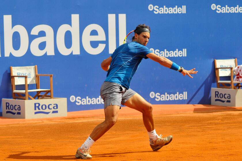 Barcelona, Spain. 25th Apr, 2014. Rafael Nadal competing to Nicolas Almagro during Barcelona Open Banc de Sabadell 2014 ATP 500 quarter finals.Nicolas Almagro defeated Rafael Nadal 6-2 6-7 4-6 at the Open 2014 Quarter Finals. Almagro will proceed to the s