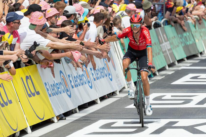 Limoges, France, 8th July 2023, Fans getting the personal touch from TEAM ARKEA - SAMSIC Stage 8, 201km, Libourne to Limoges during the 110th Edition of the Tour de France Credit: Nick Phipps/Alamy Live News