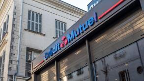 A view of Credit Mutuel Bank front store facade view with logo and signage