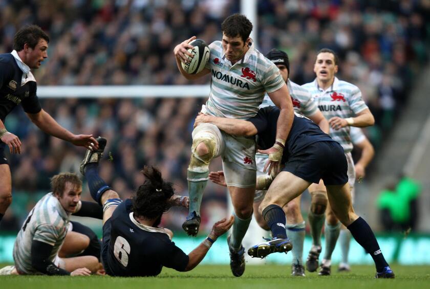 Rugby Union - Nomura Varsity Match 2009 - Oxford University v Cambridge University - Twickenham. Cambridge's Ben Maidment of breaks through the tackle of Oxford's John-Henry Carter during Nomura Varsity Match at Twickenham, London.
