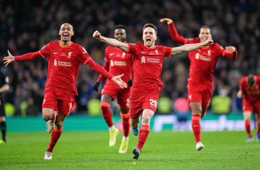 London, UK. 27th Feb, 2022. 27 February 2022 - Chelsea v Liverpool - Carabao Cup - Final - Wembley Stadium Andy Robertson and Liverpool players celebrate winning the penalty shootout in the Carabao Cup Final at Wembley Stadium. Picture Credit : Credit: Ma
