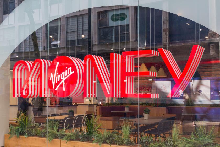 Large window sign at branch of Virgin Money bank in Birmingham city centre