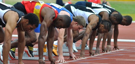 Runners on the start line of sprint race. Image shot 06/2009. Exact date unknown.