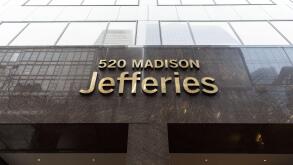 Jefferies Group LLC headquarters entrance sign at 520 Madison Avenue, Midtown Manhattan, New York City, USA